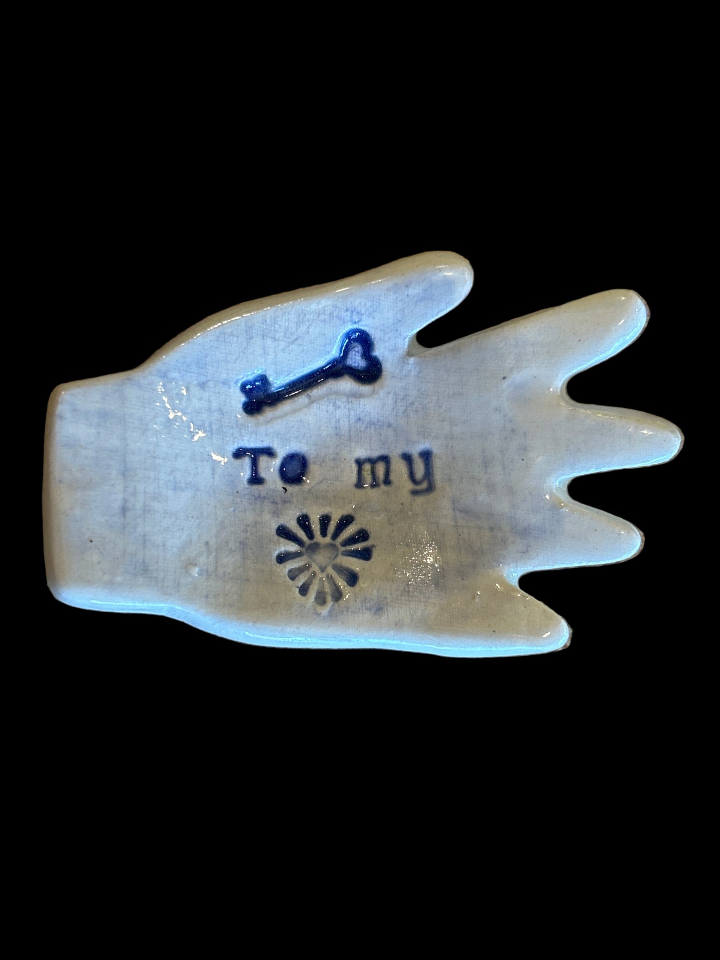 Ceramic hand trinket holder.